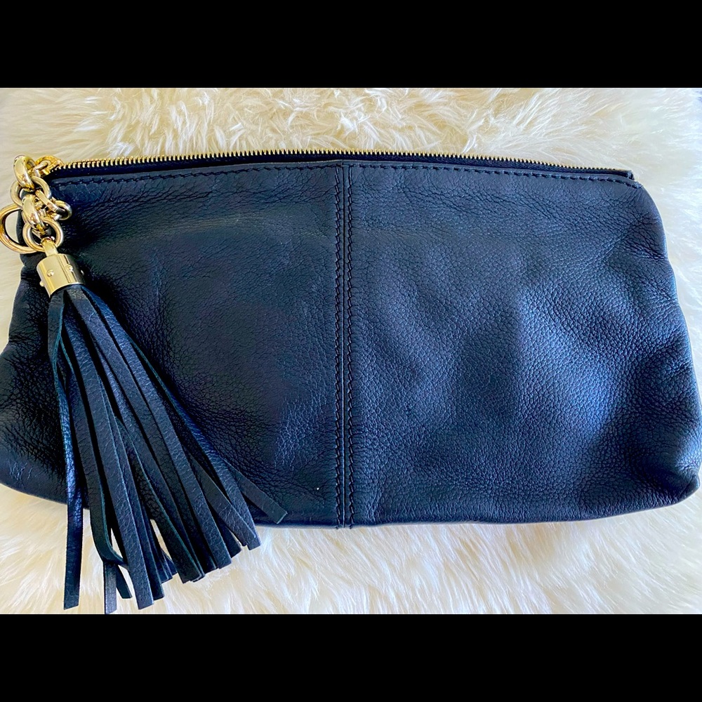 Gucci calveskin black leather clutch.